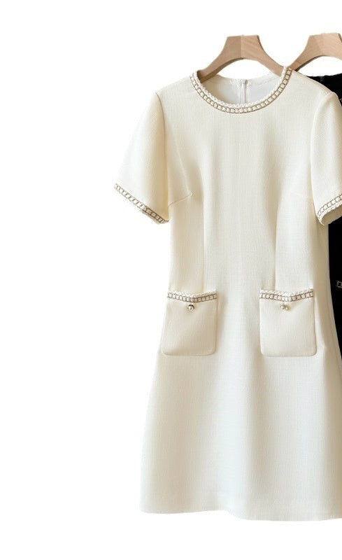 SHORT SLEEVE KNITTED DRESS WITH BEADED DETAILS