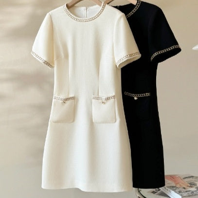 SHORT SLEEVE KNITTED DRESS WITH BEADED DETAILS